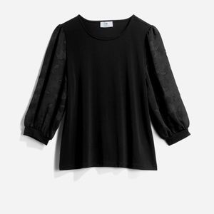 Black dressy blouse. XL. Sleeves are patterned lace. New without tags.